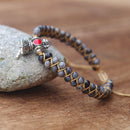 PULSEIRA FEMININA ESTILO BUDISTA ARTESANAL COM TRANÇADO DE CORDA.
