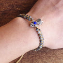 PULSEIRA FEMININA ESTILO BUDISTA ARTESANAL COM TRANÇADO DE CORDA.