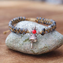 PULSEIRA FEMININA ESTILO BUDISTA ARTESANAL COM TRANÇADO DE CORDA.